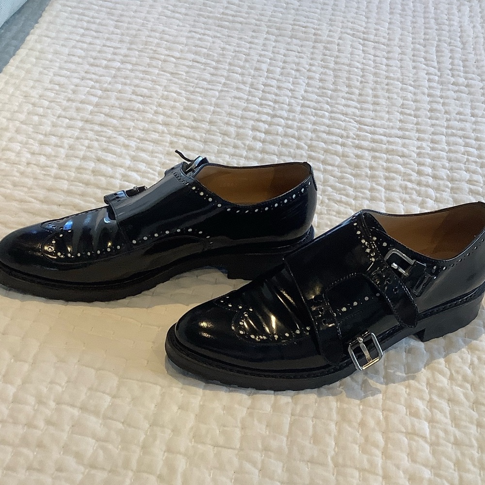 Women’s black leather monk strap shoes